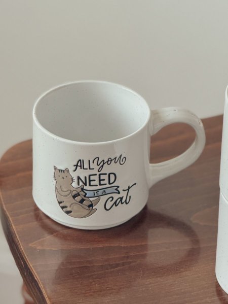 كوب قطة بعبارة ”all you need is a cat“